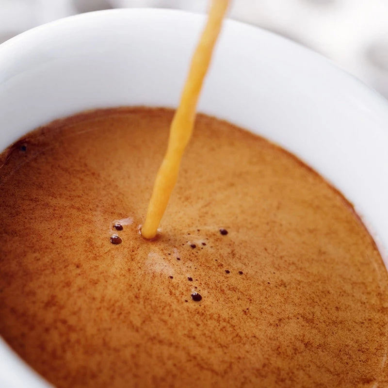 Coffee My Cup: Hot liquid being poured into a white cup filled with coffee.