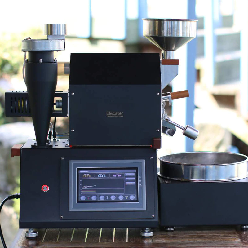 Coffee My Cup: Coffee roasting machine with digital display on a wooden surface