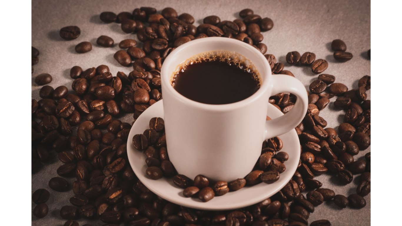 Coffee My Cup: Image of Coffee in White Mug with Coffee Beans 