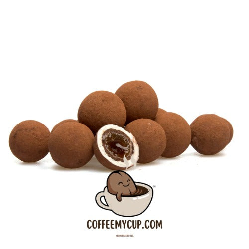 Coffee My Cup Sweet Treats Collection: Cappuccino Coco Delight: Chocolate truffles with a cartoon character in a cup and 'COFFEEMYCUP.COM' text on a white background