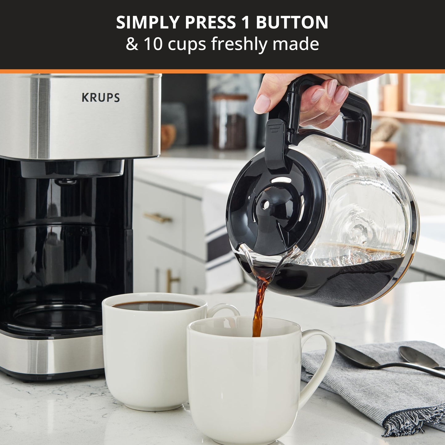 Coffee My Cup: Krups coffee maker with a person pouring coffee into a mug, kitchen setting.