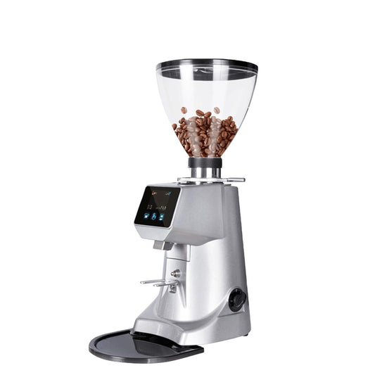 Coffee My Cup: Coffee grinder with glass container filled with coffee beans on a white background 