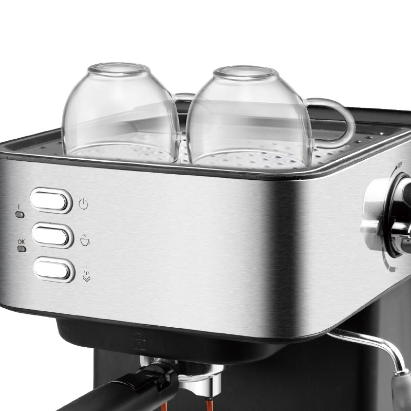 Coffee My Cup: Stainless steel espresso machine with two glass cups on a white background