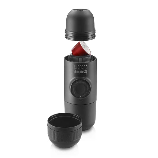 Coffee My Cup: Wacaco Minipresso portable espresso maker with a black cup on a white background