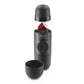 Coffee My Cup: Wacaco Minipresso portable espresso maker with a black cup on a white background