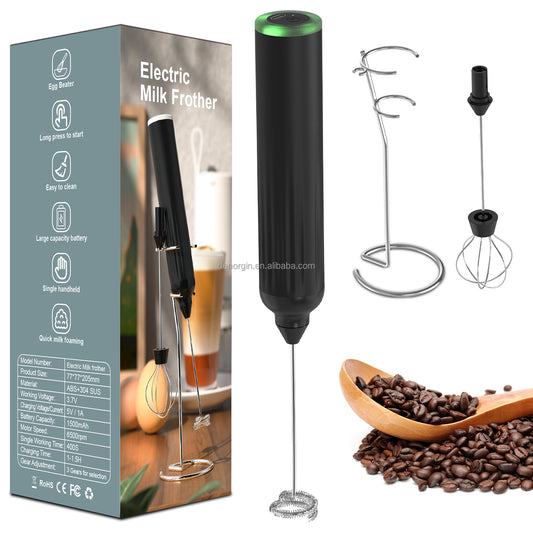 Coffee My Cup: Electric milk frother with packaging, attachments, and coffee beans on a white background