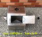 Coffee My Cup: Coffee Roaster metal container with open lid on a concrete surface, brick wall in the background