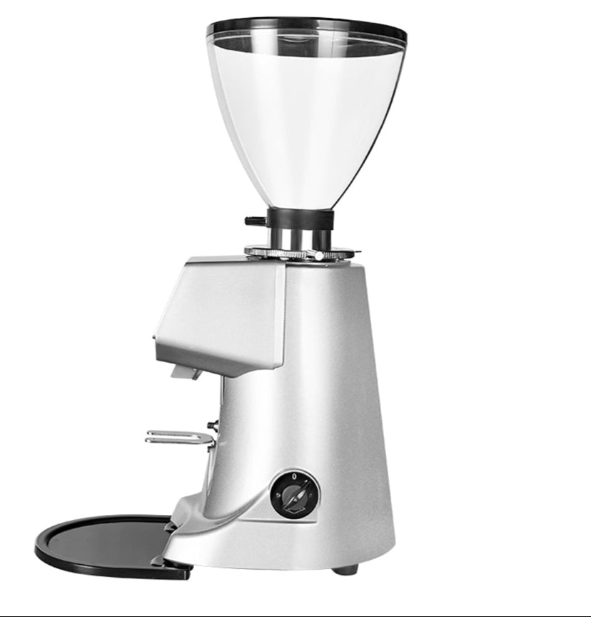Coffee My Cup: Coffee grinder with clear container on a white background.
